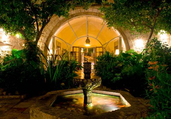 American Colony Hotel - Nighttime Courtyard American Colony Hotel - Nighttime Courtyard